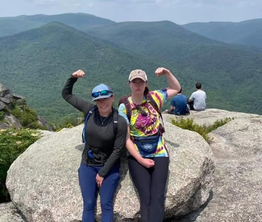 Tara and I showing our muscles after summitting Old Rag.