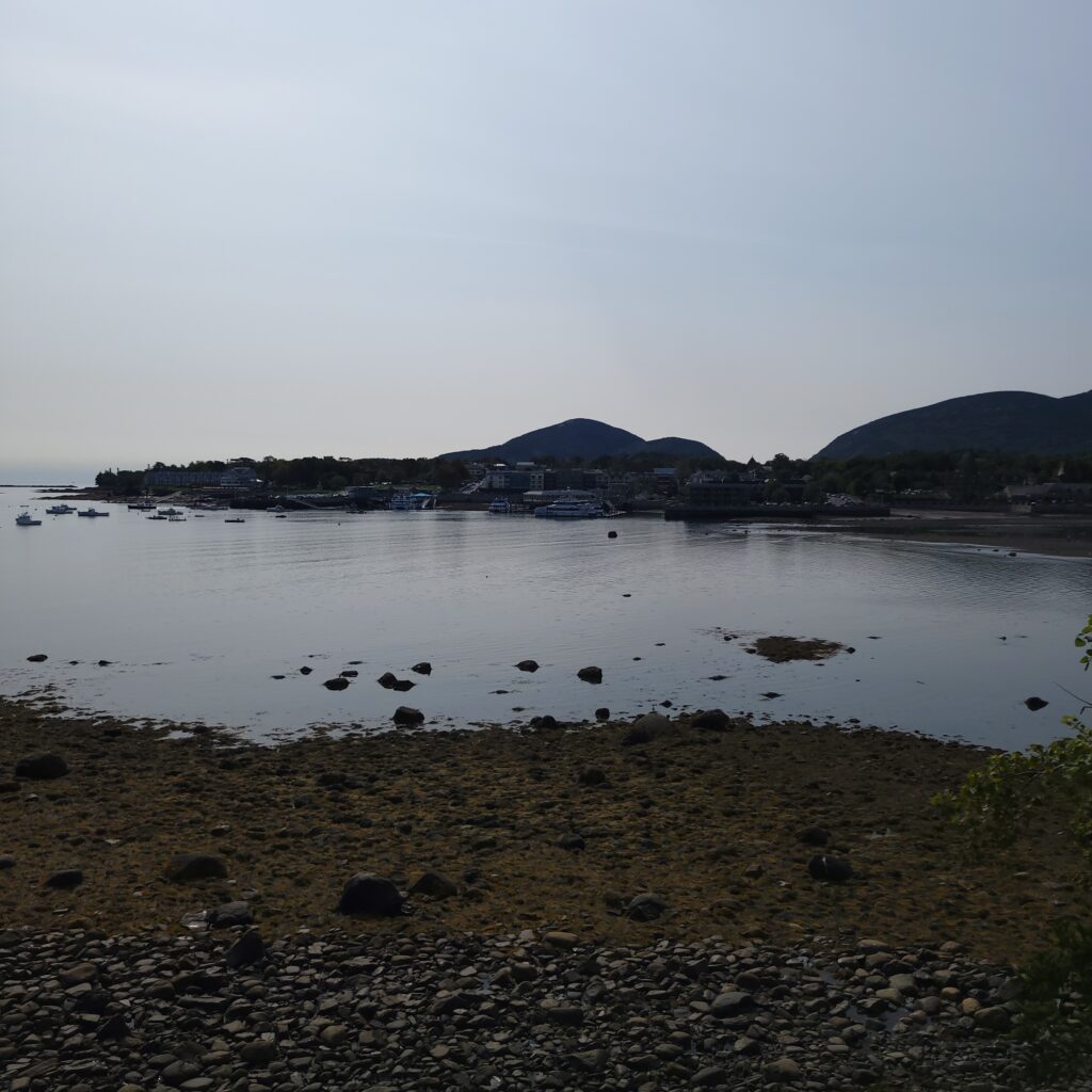 Island's mountains towering over the water
