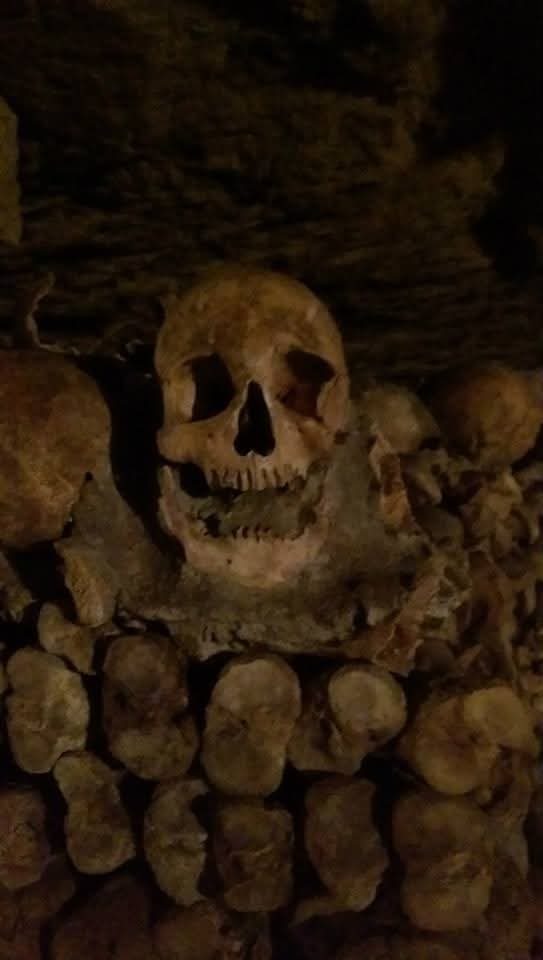 Scary skull in the Paris Catacombs